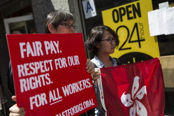 Fast Food Workers Rally And Urge International Workers To Get Involved In Higher Wage Movement